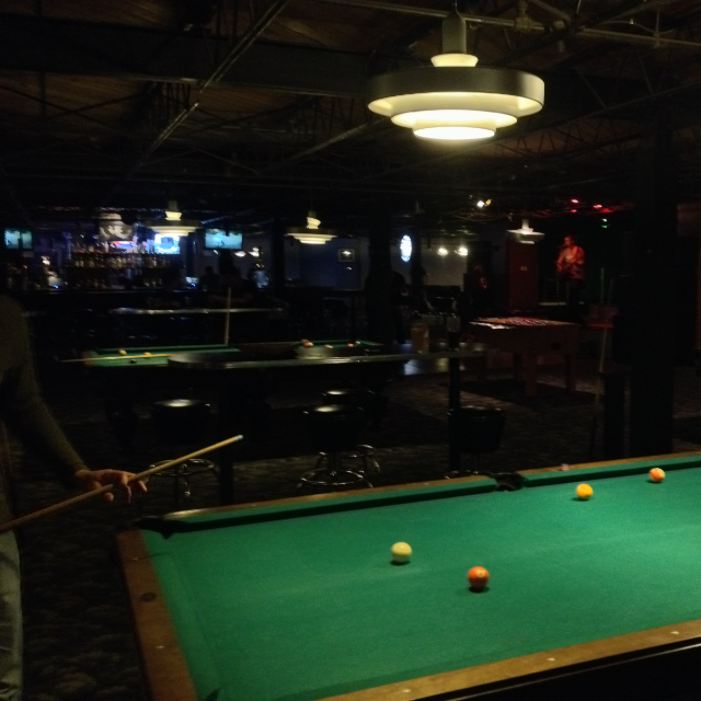 At the pool hall.
